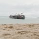 Syahdunya Pantai Tanjung Kerasak di Bawah Gerimis Sore