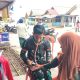 Tak Hanya Bangun Jalan, Satgas TMMD Ke-127 Gelar Penyuluhan Posbindu di Desa Penutuk